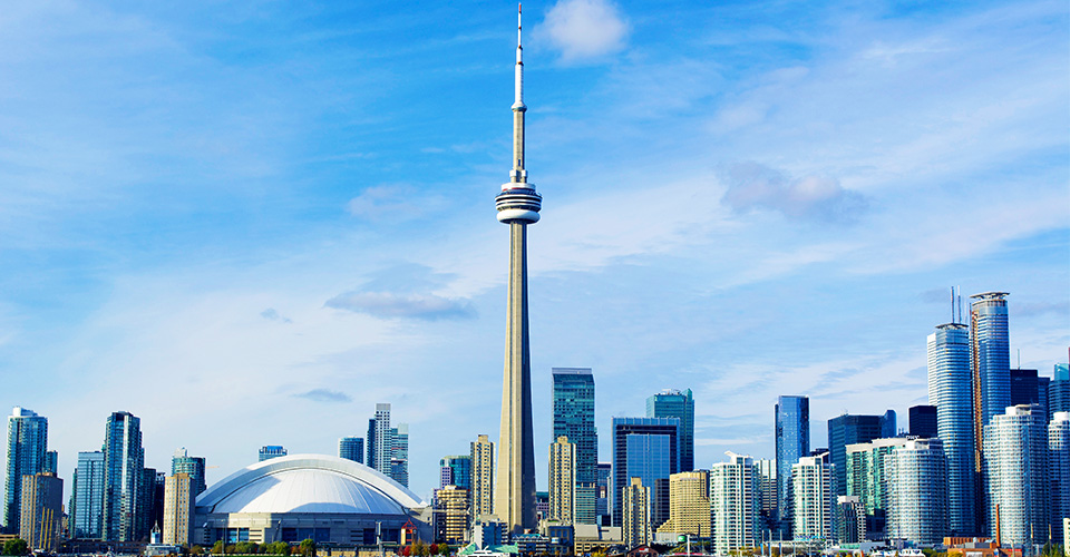 Picture of the C.N. Tower, which is a skinny tower with a point at the top.