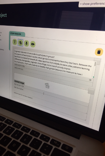 Open laptop with the Storytelling story builder tool website open on screen. A block of text has been written and a picture block has been selected as the next section to be added.